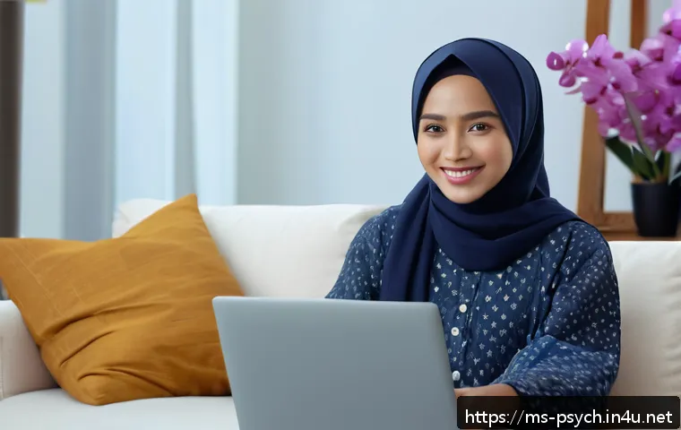 심리학 연구동향 - A young Malay woman sitting comfortably in a modern living room, wearing modest casual clothing, eng...