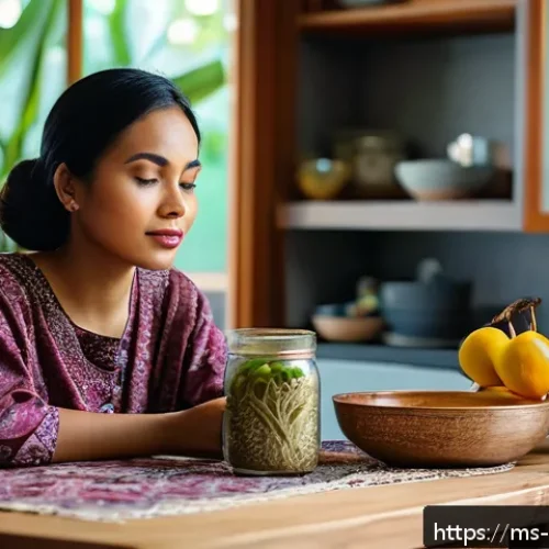 Home 31 행동심리학 - A young Malay woman sitting at a cozy kitchen table in a modern Malaysian home, looking contemplativ...